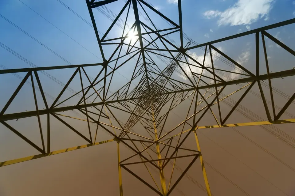 High-voltage power lines and pylons, part of the grid costs that show up in residential rates