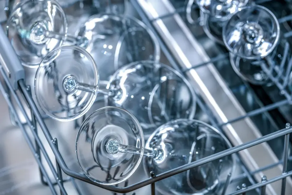 A dishwasher in a kitchen, one of the household appliances that adds to monthly electricity use