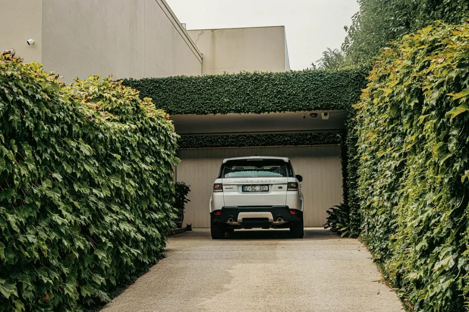 A suburban house exterior with a driveway and garage, the kind of home buyers are comparing