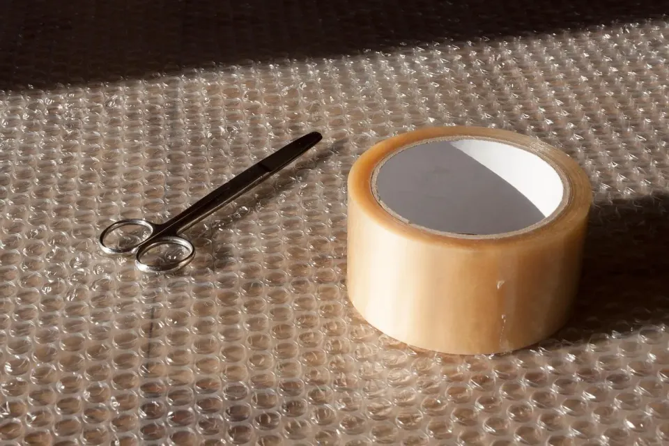 scissors, duct tape, blister foil, pack